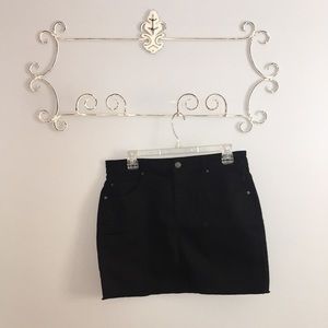 Black denim mini skirt from Garage.